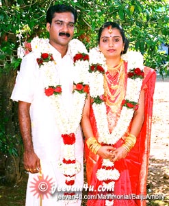 Baiju Raj Ambily wedding images at Sree Mahadeva Temple Kadappattoor Pala